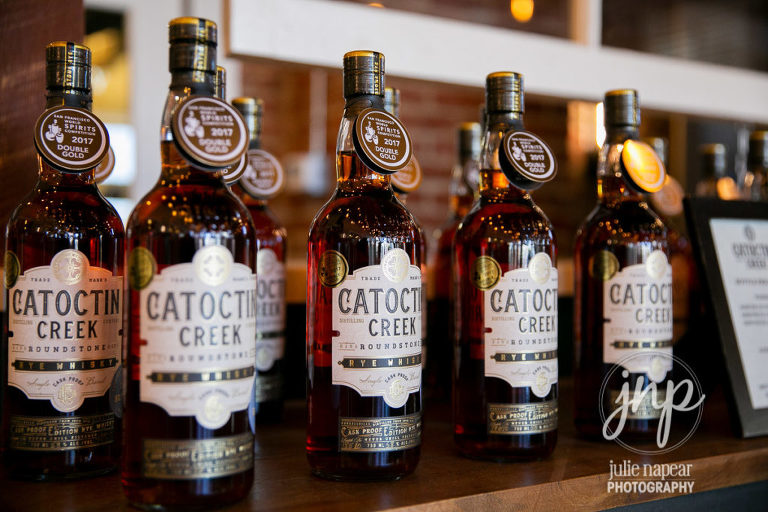 Whiskey Bottles at Catoctin Creek Distillery in Purcellville, VA, image by Julie Napear Photography